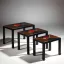 Gaston SUISSE (1896-1988) - Suite de trois tables gigognes en laque noire, 1936